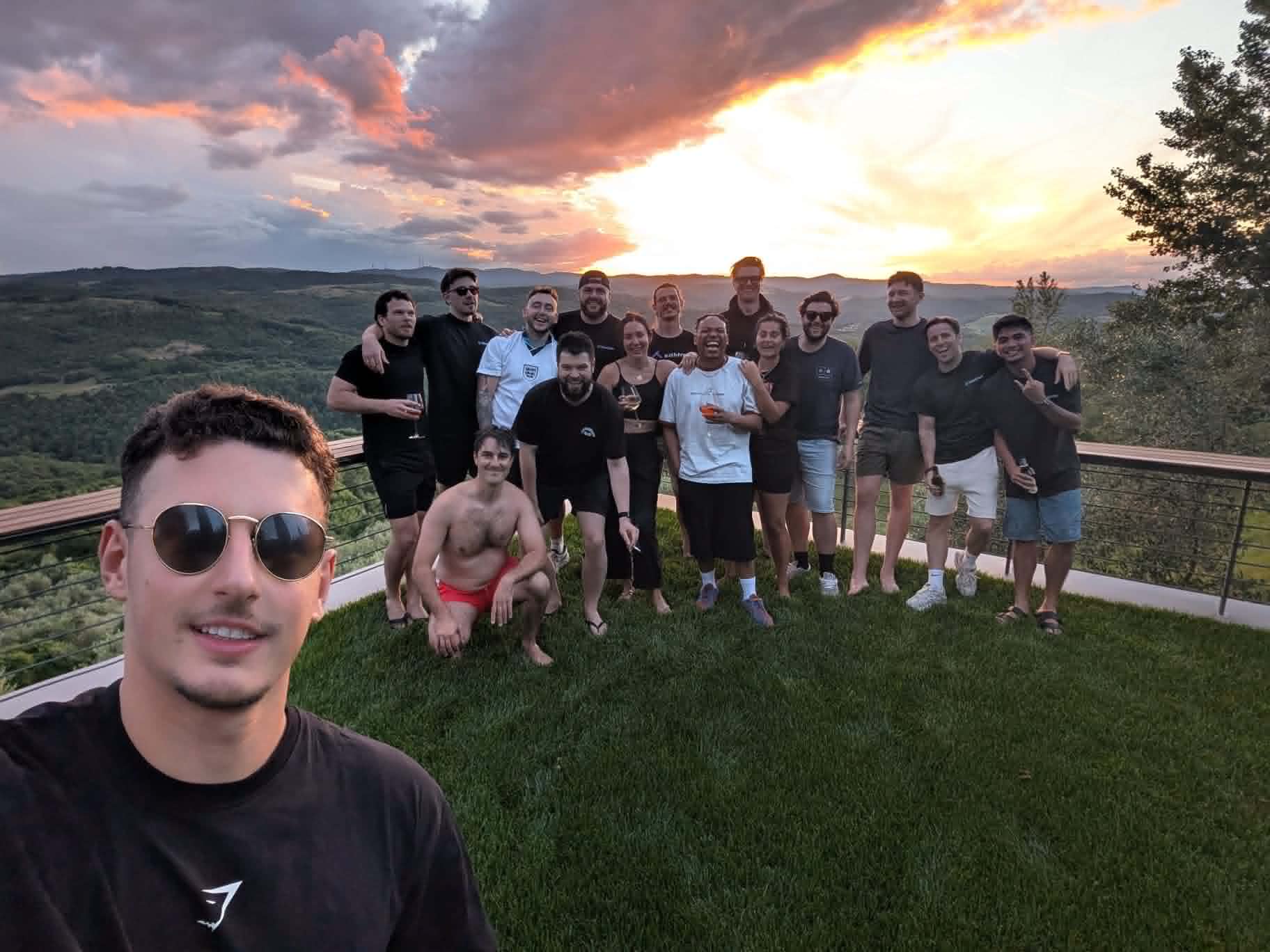 Our NorthQA and client teams together at sunset during the offsite
