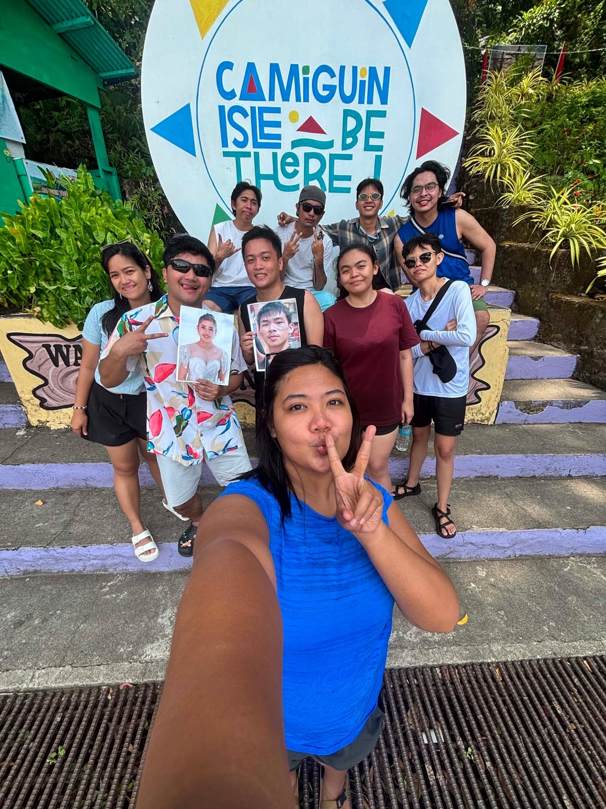 The NorthQA team at the Camiguin Isle Be There sign